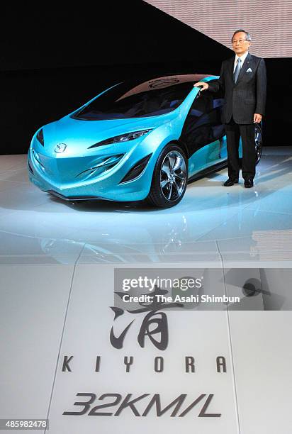 Mazda Motor Co President Takashi Yamanouchi introduce the 'Kiyora' during the Tokyo Motor Show at Makuhari Messe on October 21, 2009 in Chiba, Japan.