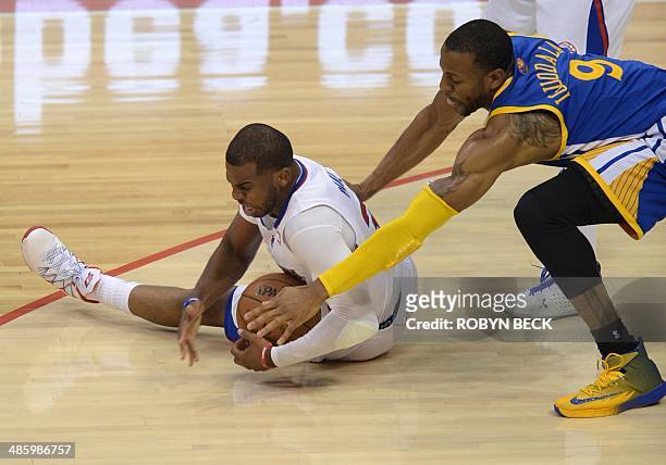 Los Angeles Clippers Chris Paul and Golden State Warriors Andre Iguodala go after a loose ball during Game Two of the NBA Western Conference...