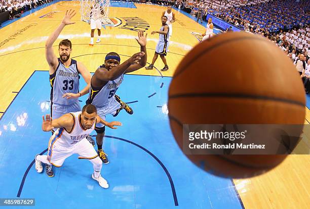 Zach Randolph of the Memphis Grizzlies blocks the shot by Thabo Sefolosha of the Oklahoma City Thunder in Game Two of the Western Conference...