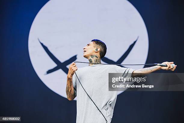 Josh Friend of Modestep performs on the main stage during day 3 of Leeds Festival at Bramham Park on August 30, 2015 in Leeds, England.