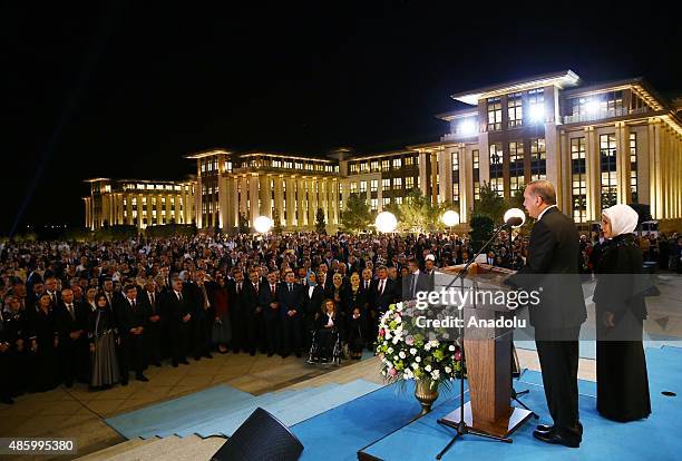 President of Turkey Recep Tayyip Erdogan delivers a speech next to his wife Emine Erdogan during the 30 August Victory Day reception in Presidential...