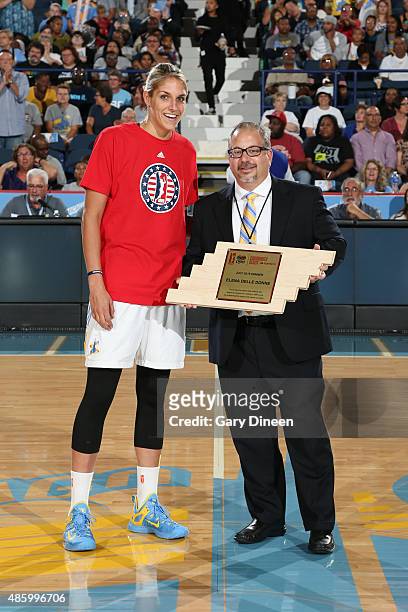 Elena Delle Donne of the Chicago Sky is presented with the WNBA Cares Community Assist Award Presented by State Farm, for the month of July, by Adam...