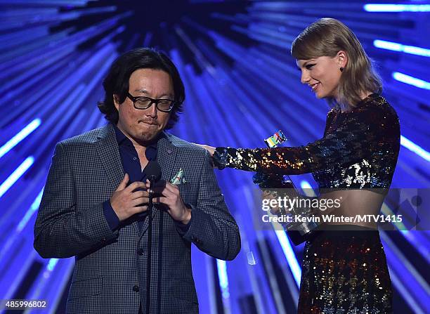 Director Joseph Kahn and recording artist Taylor Swift accept the Best Female Video award for "Blank Space" onstage during the 2015 MTV Video Music...