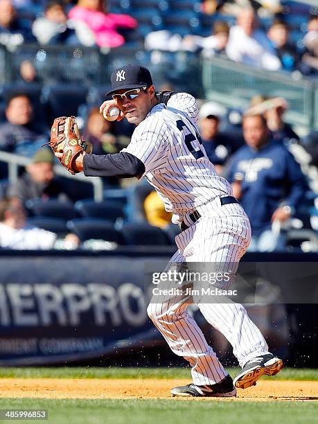 Scott Sizemore of the New York Yankees in action against the Chicago Cubs during the first game of a doubleheader at Yankee Stadium on April 16, 2014...