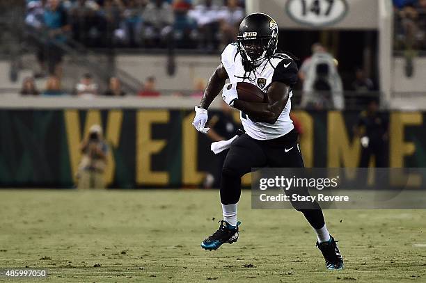 Denard Robinson of the Jacksonville Jaguars runs for yards during a preseason game against the Detroit Lions at EverBank Field on August 28, 2015 in...