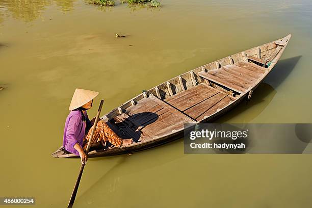 vietnamese water taxi in hoi an - wooden boat stock pictures, royalty-free photos & images