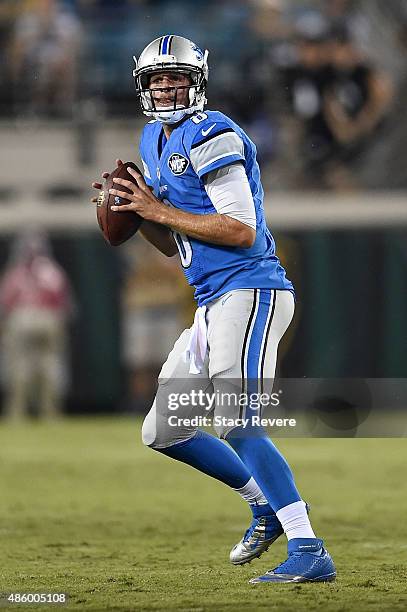 Dan Orlovsky of the Detroit Lions drops back to pass during a preseason game against the Jacksonville Jaguars at EverBank Field on August 28, 2015 in...