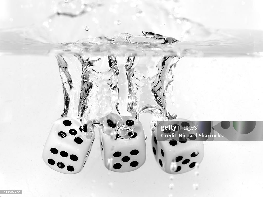 Three dice in water