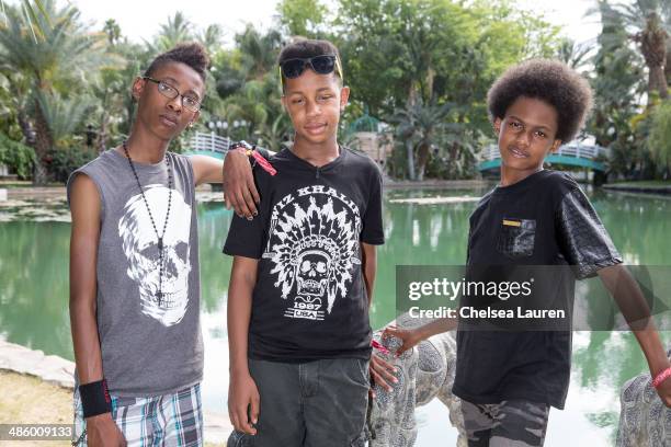 Musicians Alec Atkins, Jarad Dawkins and Malcolm Brickhouse of Unlocking the Truth pose backstage during the Coachella valley music and arts festival...