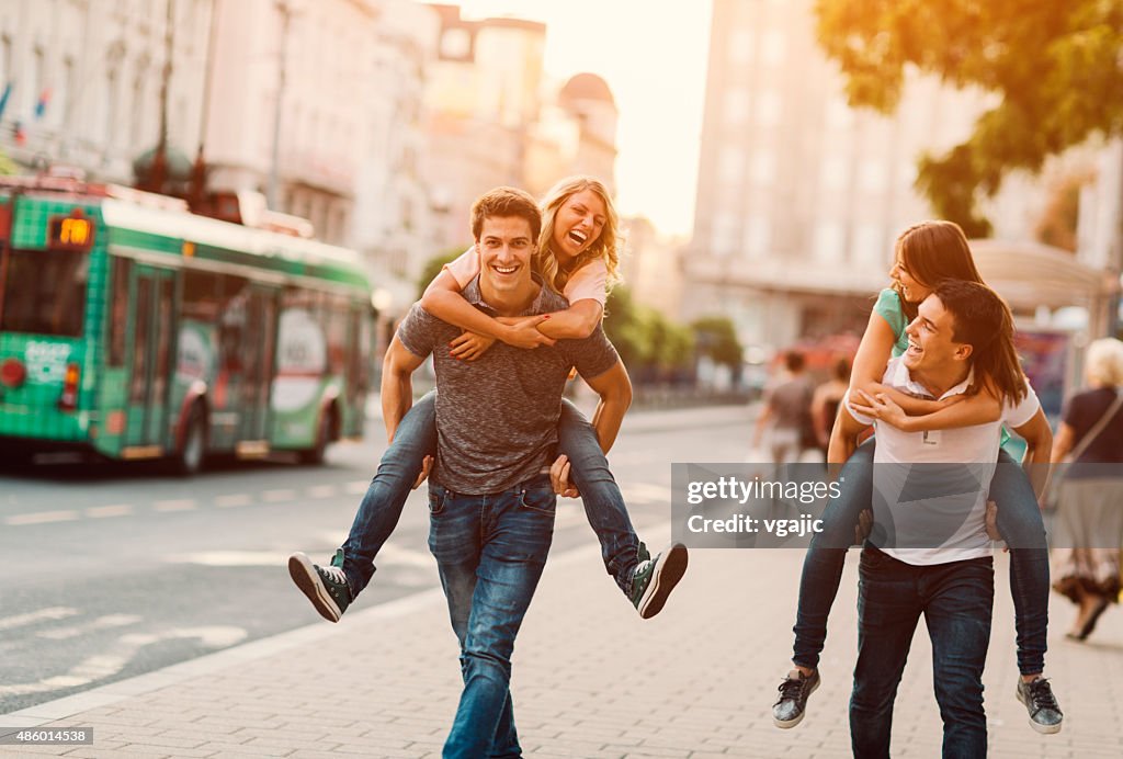 Happy Couples In A City.