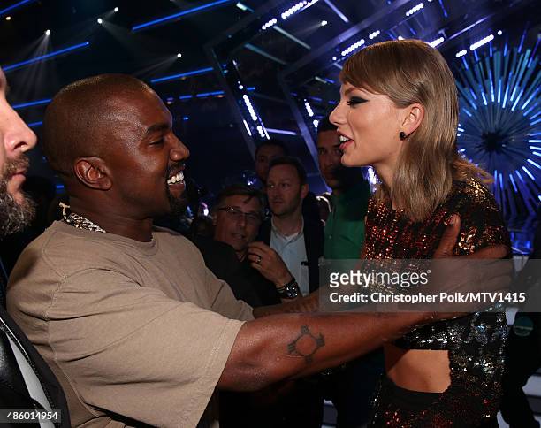 Recording artists Kanye West and Taylor Swift hug during the 2015 MTV Video Music Awards at Microsoft Theater on August 30, 2015 in Los Angeles,...