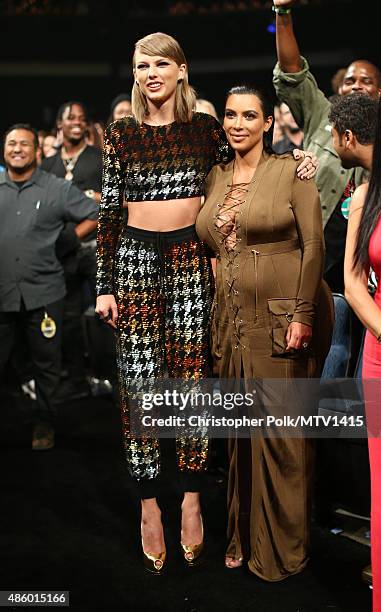 Recording artist Taylor Swift and TV personality Kim Kardashian attend the 2015 MTV Video Music Awards at Microsoft Theater on August 30, 2015 in Los...