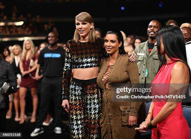 Recording artist Taylor Swift and TV personality Kim Kardashian attend the 2015 MTV Video Music Awards at Microsoft Theater on August 30, 2015 in Los...