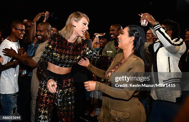 Taylor Swift and Kim Kardashian West attend the 2015 MTV Video Music Awards at Microsoft Theater on August 30, 2015 in Los Angeles, California.