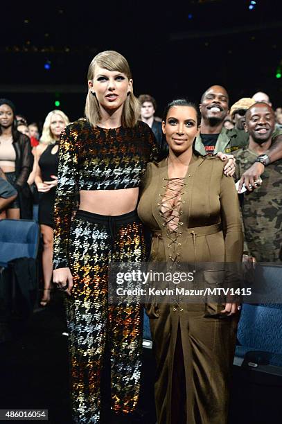 Taylor Swift and Kim Kardashian West attend the 2015 MTV Video Music Awards at Microsoft Theater on August 30, 2015 in Los Angeles, California.