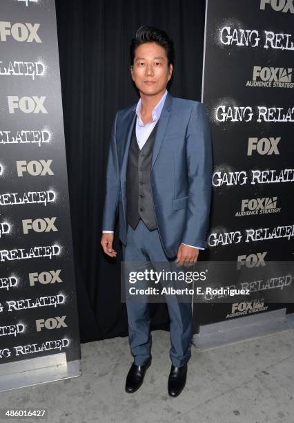 Actor Sung Kang arrives to the premiere of Fox's "Gang Releted" at Homeboy Industries on April 21, 2014 in Los Angeles, California.