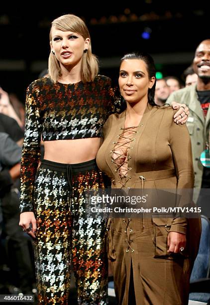 Singer-songwriter Taylor Swift and TV personality Kim Kardashian attend the 2015 MTV Video Music Awards at Microsoft Theater on August 30, 2015 in...