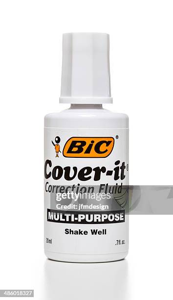 bic cover-it correction fluid bottle - correction fluid stockfoto's en -beelden