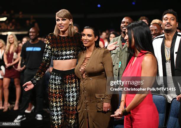 Recording artist Taylor Swift and TV personality Kim Kardashian attend the 2015 MTV Video Music Awards at Microsoft Theater on August 30, 2015 in Los...