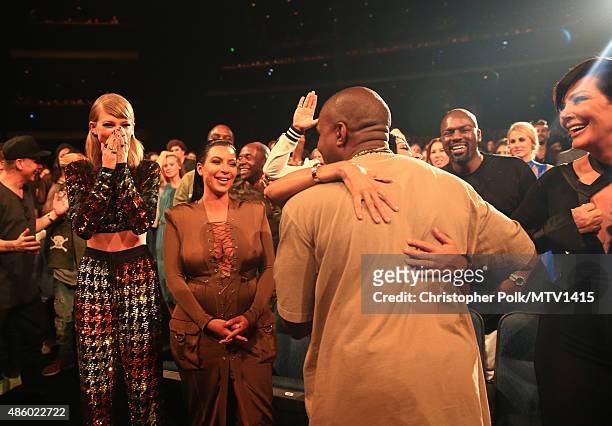 Recording artist Taylor Swift, TV personality Kim Kardashian and recording artist Kanye West attend the 2015 MTV Video Music Awards at Microsoft...