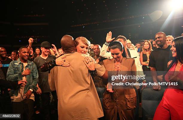 Recording artists Kanye West, Taylor Swift, and TV personality Kim Kardashian attend the 2015 MTV Video Music Awards at Microsoft Theater on August...