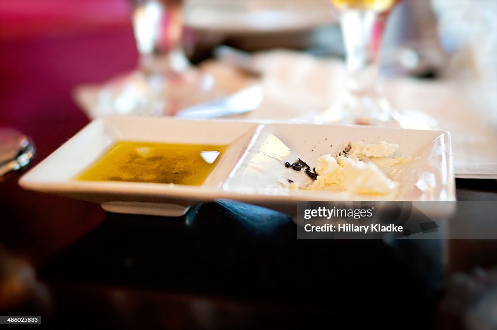 Plates with butter and olive oil