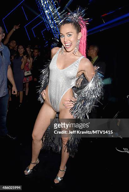 Host Miley Cyrus, styled by Simone Harouche, poses backstage during the 2015 MTV Video Music Awards at Microsoft Theater on August 30, 2015 in Los...