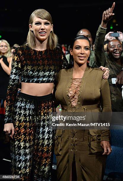 Taylor Swift and Kim Kardashian West attend the 2015 MTV Video Music Awards at Microsoft Theater on August 30, 2015 in Los Angeles, California.