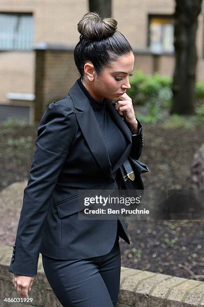 Tulisa Contostavlos arrives at court where she faces drug offence charges at Southwark Crown Court on April 22, 2014 in London, England.