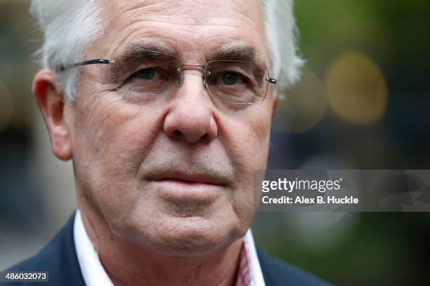 Max Clifford arrives to face sexual assault charges at Southwark Crown Court on April 22, 2014 in London, England.