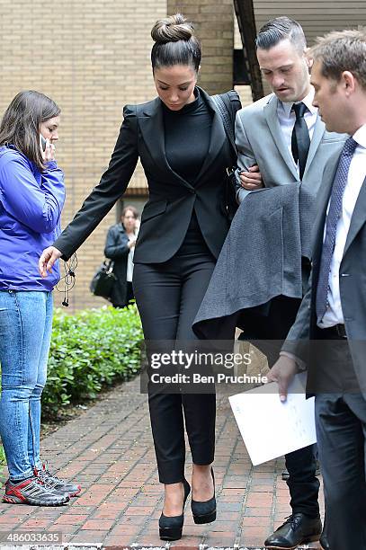 Tulisa Contostavlos departs court where she faces drug offence charges at Southwark Crown Court on April 22, 2014 in London, England.