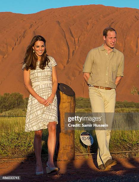 Prince William, Duke of Cambridge and Catherine, Duchess of Cambridge view Ayers Rock at sunset on April 22, 2014 in Ayers Rock, Australia. The Duke...