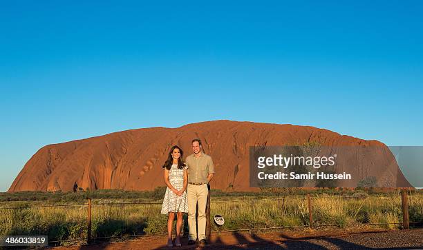 Prince William, Duke of Cambridge and Catherine, Duchess of Cambridge view Ayers Rock at sunset on April 22, 2014 in Ayers Rock, Australia. The Duke...