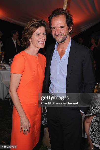 Irene Jacob and Stephane De Groodt attend the closing dinner hosted by IWC during the Festival du Film Francophone d'Angouleme on August 30,...