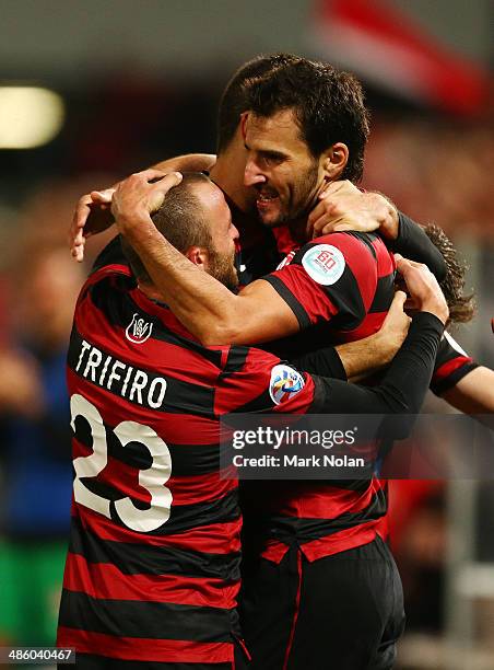 Labinot Haliti of the Wanderers celebrates scoring a goal with team mates during the AFC Asian Champions League match between the Western Sydney...