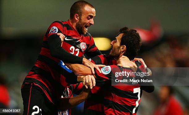 Labinot Haliti of the Wanderers celebrates scoring a goal with team mates during the AFC Asian Champions League match between the Western Sydney...