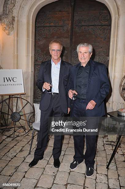Christophe Lambert and Claude Lelouch attend the closing dinner hosted by IWC during the Festival du Film Francophone d'Angouleme on August 30,...