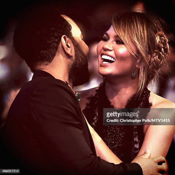 Recording artist John Legend and model Chrissy Teigen attend the 2015 MTV Video Music Awards at Microsoft Theater on August 30, 2015 in Los Angeles,...