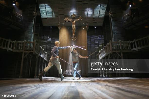 Actors Alex Hassell who plays Prince Hal and Trevor White, who plays Hotspur, rehearse a fight scene before the start of the matinee performance of...