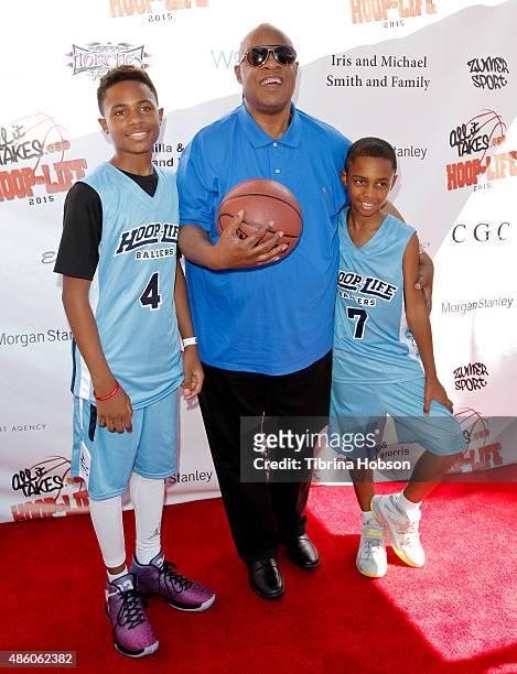Stevie Wonder and his sons Kailand Morris and Mandla Morris attend the 3rd annual Hoop-Life FriendRaiser at Galen Center on August 30, 2015 in Los...