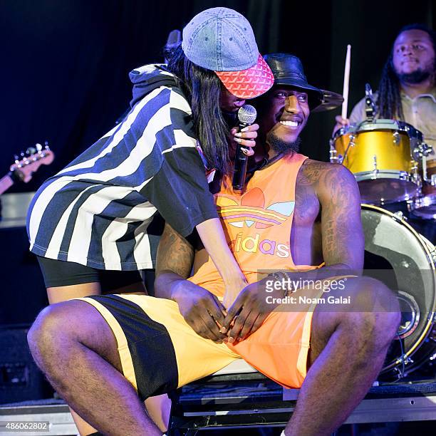 Singer Teyana Taylor performs with NBA player Iman Shumpert at Nikon at Jones Beach Theater on August 30, 2015 in Wantagh, New York.
