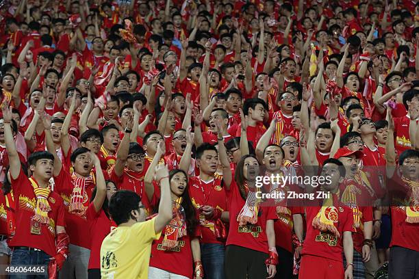 Supporters of Guangzhou Evergrande cheer during the AFC Asian Champions League match between Guangzhou Evergrande and Yokohama F. Marinos at Tianhe...