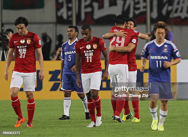 Elkeson de Oliveira Cardoso of Guangzhou Evergrande is congratulated by his team mates after scoring a goal during the AFC Asian Champions League...