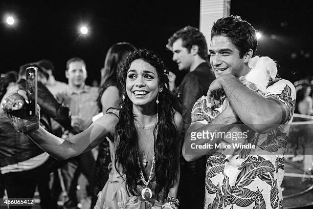 Vanessa Hudgens and Tyler Posey attend the 2015 MTV Video Music Awards at Microsoft Theater on August 30, 2015 in Los Angeles, California.