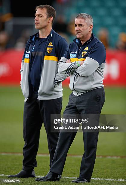 Alastair Clarkson, Senior Coach of the Hawks looks on with Chris Fagan, General Manager Football Operations during the 2015 AFL round 22 match...