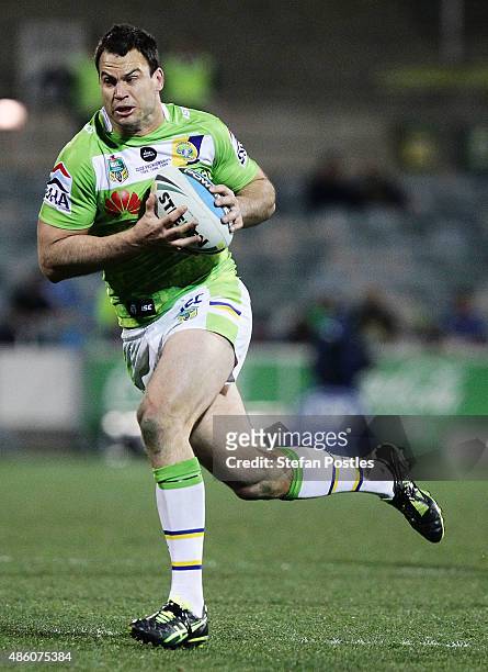 David Shillington of the Raiders runs the ball during the round 25 NRL match between the Canberra Raiders and the Penrith Panthers at GIO Stadium on...