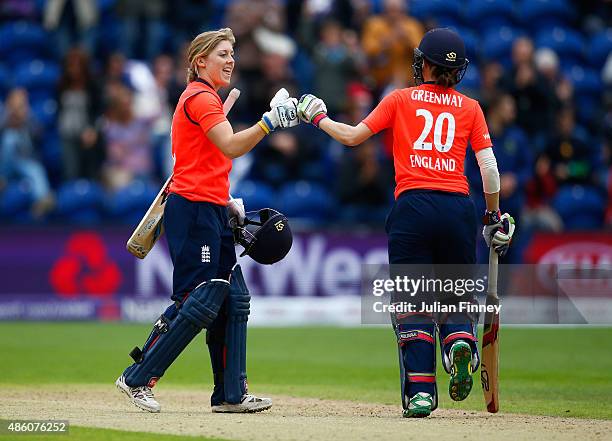 Lydia Greenway of England celebrates winning the match with Heather Knight of England during the 3rd NatWest T20 of the Women's Ashes Series between...