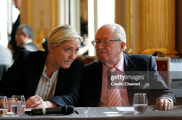 French far-right Front National founder and honorary President Jean-Marie Le Pen and his daugther FN's party president Marine Le Pen attend a press...
