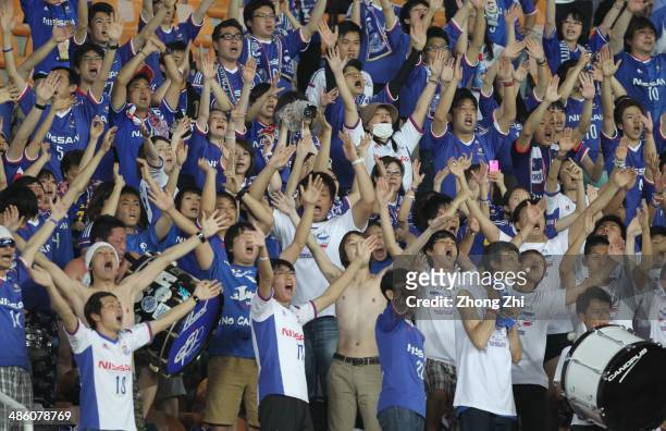 Supporters of Yokohama F. Marinos cheer during the AFC Asian Champions League match between Guangzhou Evergrande and Yokohama F. Marinos at Tianhe...