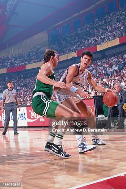 Drazen Petrovic of Yugoslavia dribbles against Danny Ainge of the Boston Celtics during the 1988 McDonald's Championships on October 21, 1988 at the...